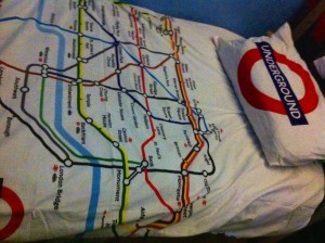 Alex is using a London Underground bed quilt to help him when he travels to London for a speech.